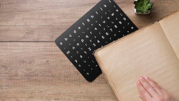 Flat lay braille alphabet board