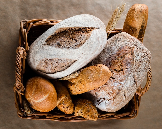 Flat lay of bread and croissants in basket