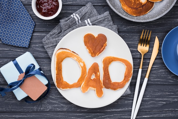 Flat lay bread letters for father's day and heart