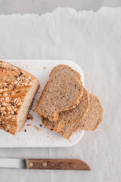 Flat lay bread slices with knife