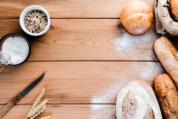 Flat lay of bread on wooden background