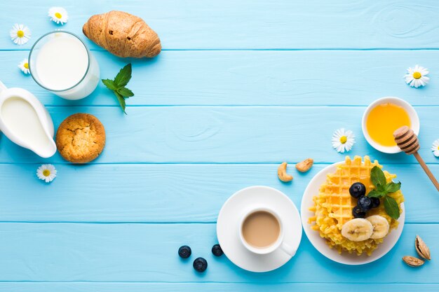 Flat lay breakfast table with copyspace