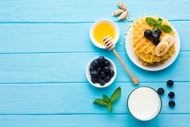 Flat lay breakfast table with copyspace