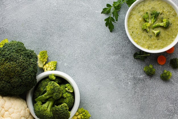 Flat lay broccoli vegetables and bisque