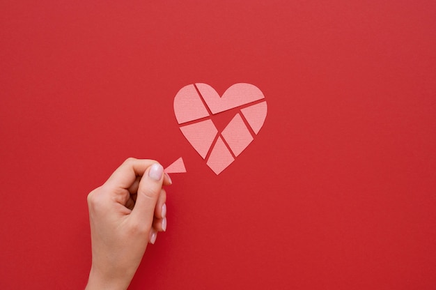 Free photo flat lay of broken heart background