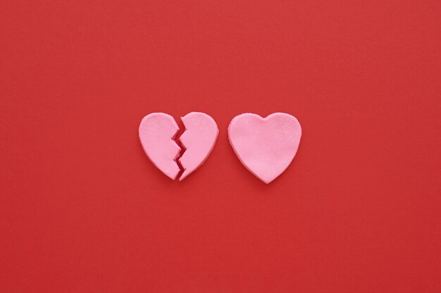 Free photo flat lay of broken heart background