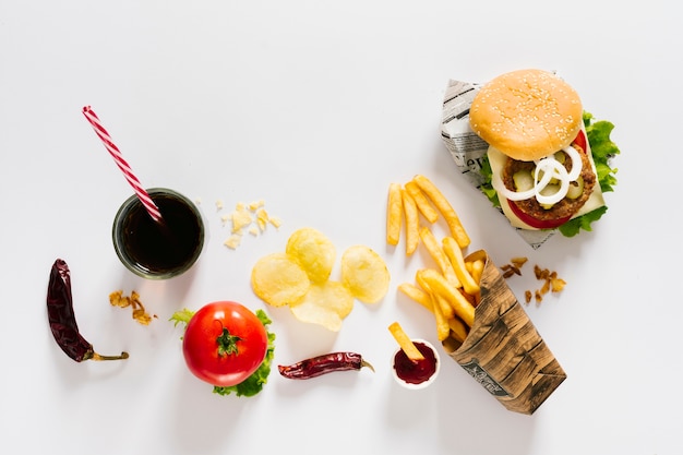 Flat-lay burger and fries with soda