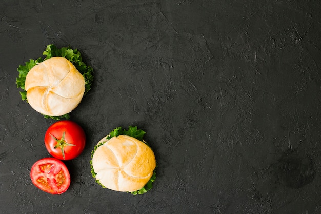 Flat-lay burger on slate with copyspace