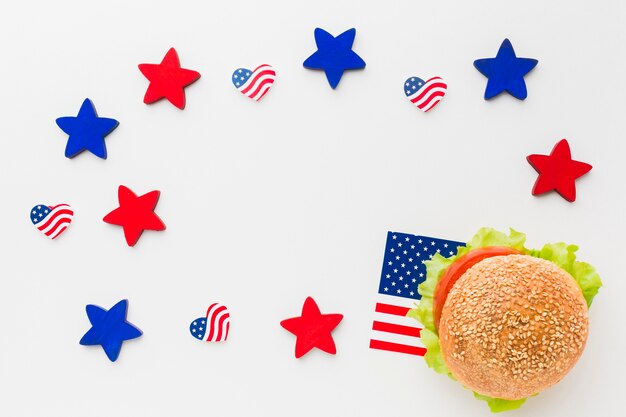 Flat lay of burger with american flags and stars