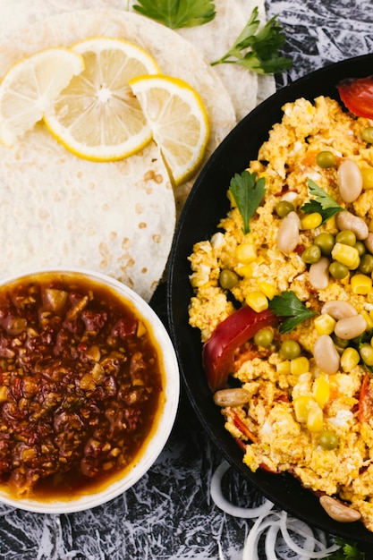 Free photo flat lay burrito ingredients