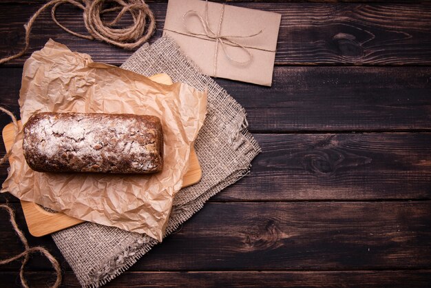 Flat lay of cake on parchment paper and cloth