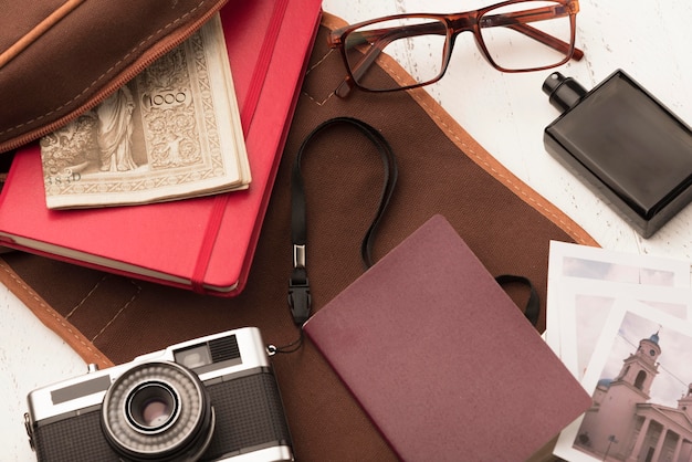 Flat lay camera and book arrangement