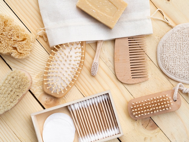 Flat lay care products on wooden table