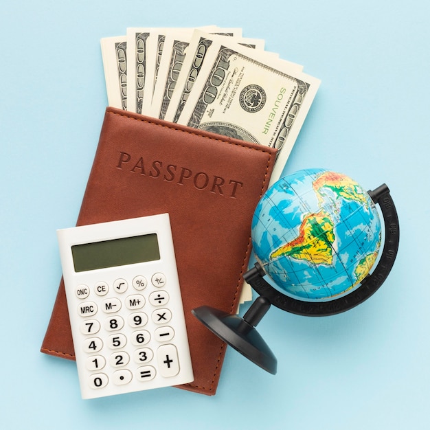 Flat lay cash and passport arrangement