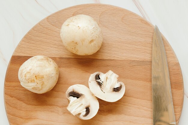 Flat lay of champignon mushrooms