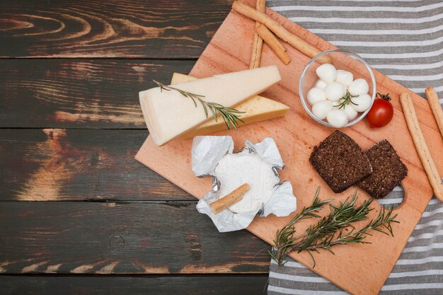 Flat lay cheese composition with copyspace