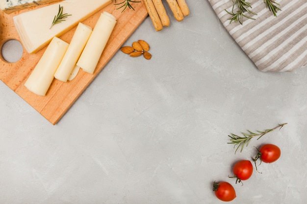 Flat lay cheese composition with copyspace