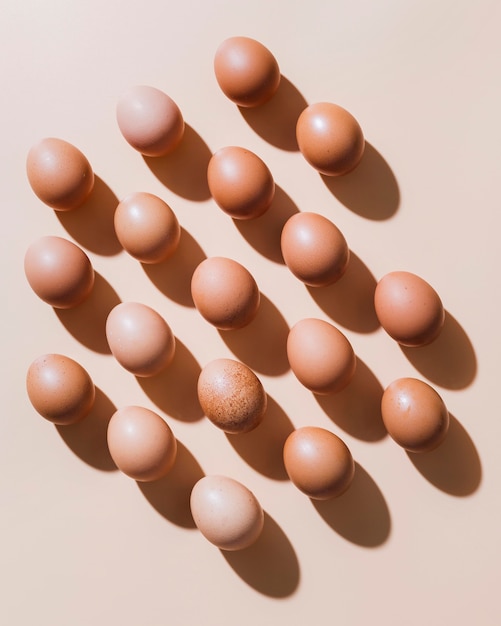 Flat lay chicken eggs on table