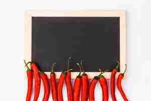 Free photo flat lay of chilis and slate