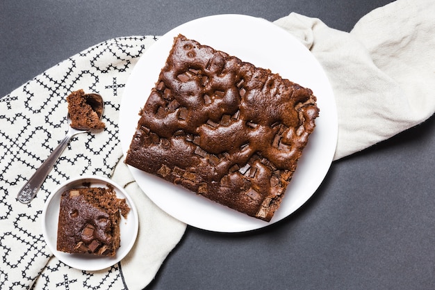 Flat lay chocolate cake on a cloth