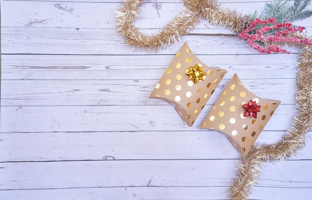 Flat lay of Christmas boxes on wooden background