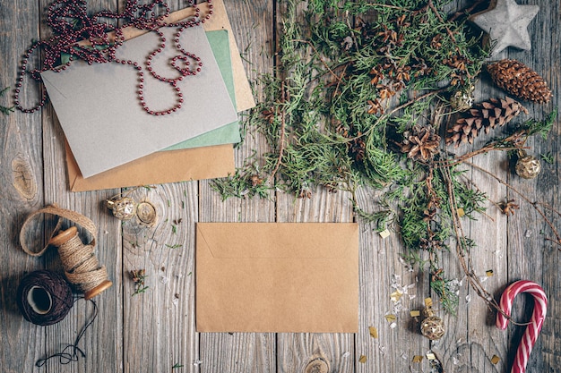 Flat lay christmas composition with letters on a wooden surface