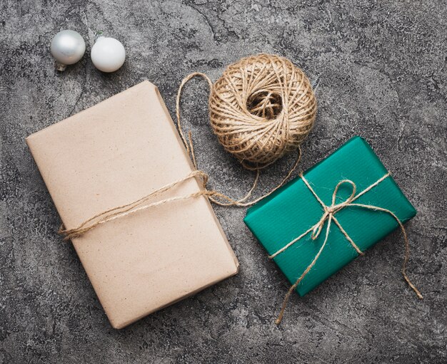 Flat lay of christmas gifts on marble background