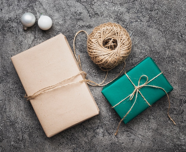Flat lay of christmas gifts on marble background