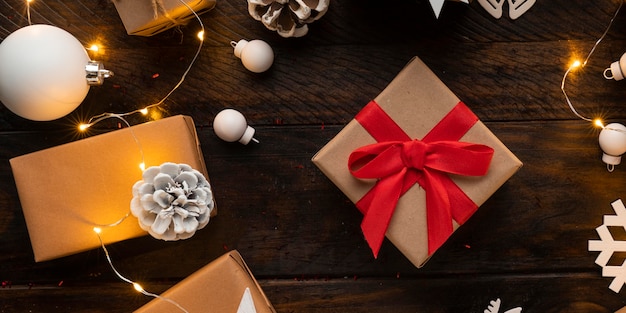 Flat lay of christmas gifts on wooden table