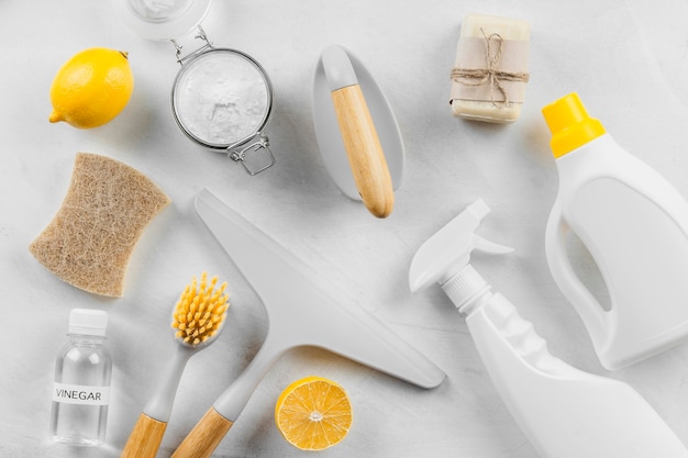 Flat lay of cleaning products with lemon and baking soda