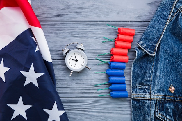 Flat lay of clock and USA attributes