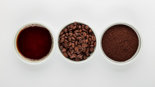 Flat lay coffee arrangement on white background