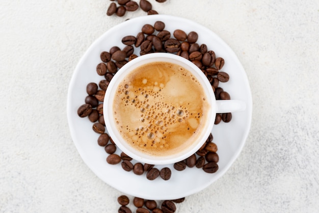 Flat lay of coffee in white cup