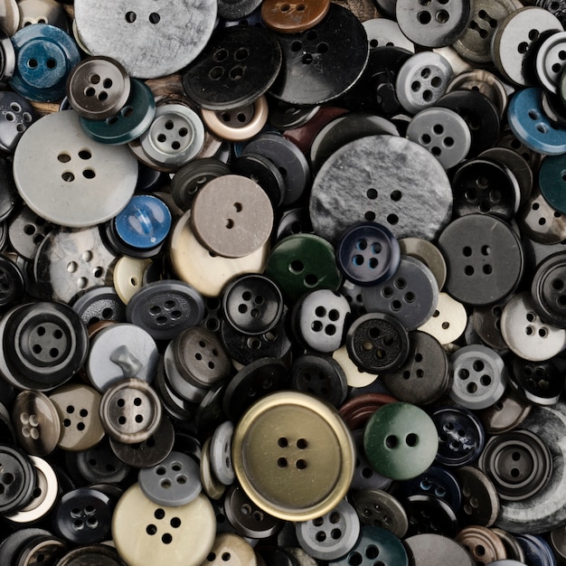 Free photo flat lay of colored buttons