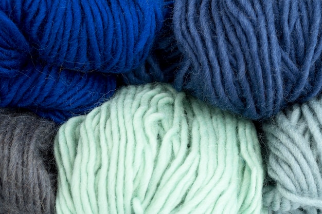 Free photo flat lay of colored yarn for crochet