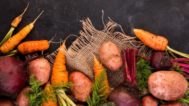 Flat lay colorful arrangement of vegetables