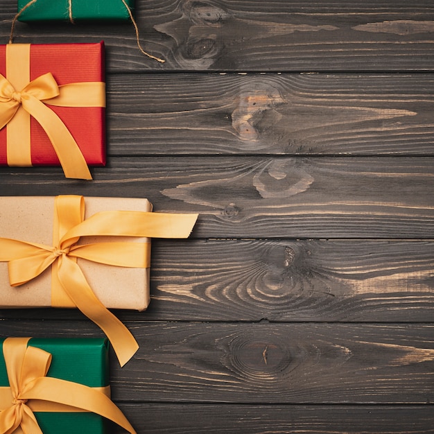 Flat lay of colorful christmas presents with ribbon