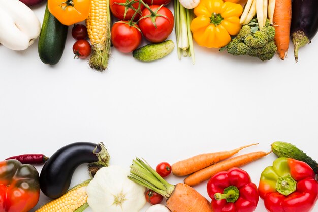 Flat lay colorful composition of vegetables with copy space