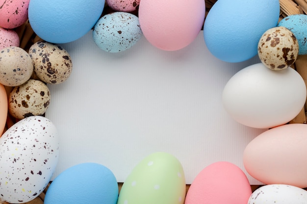 Flat lay of colorful easter eggs frame