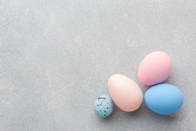 Flat lay of colorful easter eggs with copy space