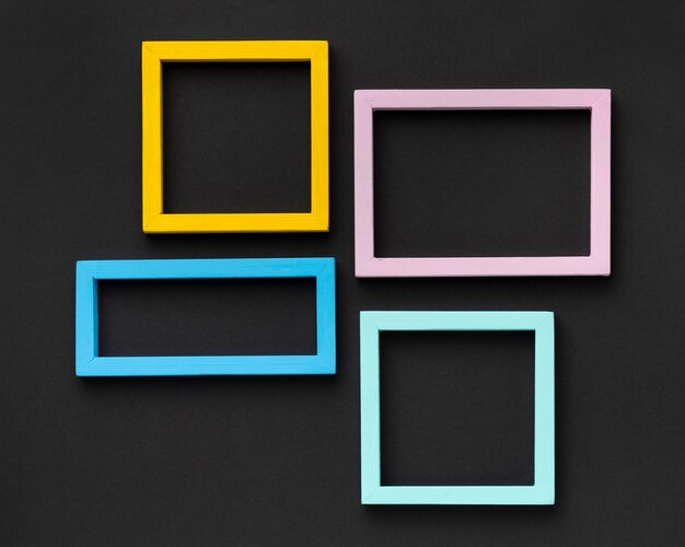 Flat lay colorful frames arrangement