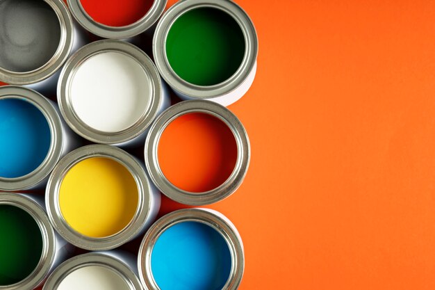 Flat lay colorful paint cans