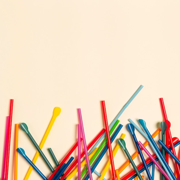 Flat lay colorful plastic straw collection