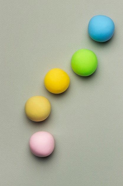 Flat lay colorful play dough balls