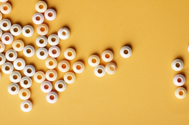 Free photo flat lay of colorful round candy