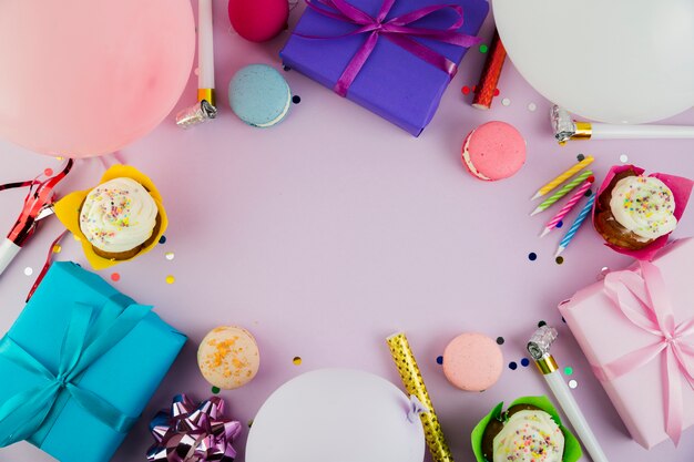 Flat lay composition of birthday elements with copyspace