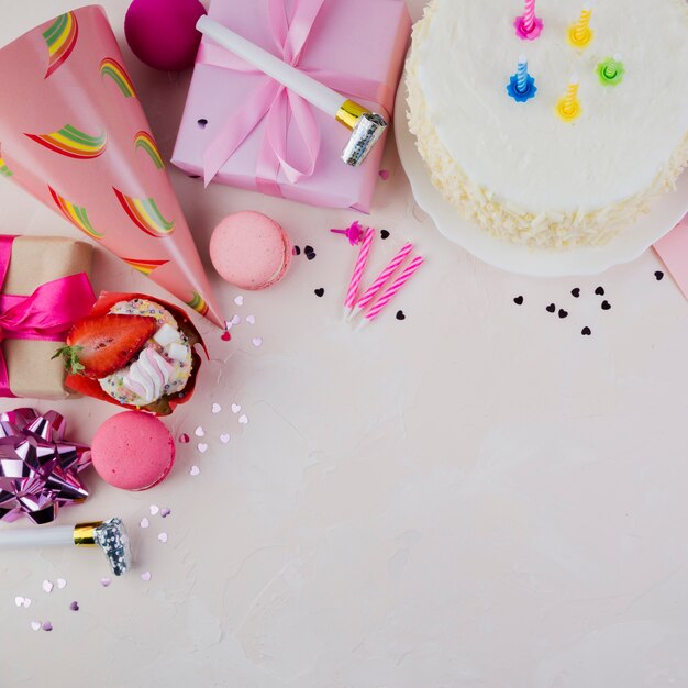 Flat lay composition of birthday elements with copyspace