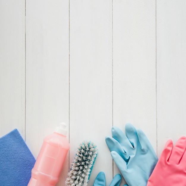 Flat lay composition of cleaning products with copyspace