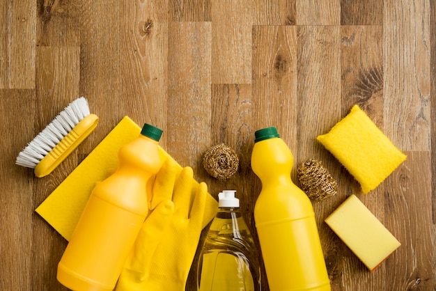 Flat lay composition of cleaning products with copyspace