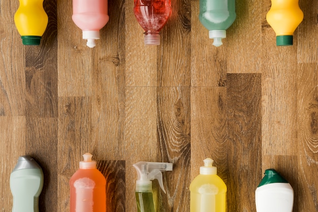 Flat lay composition of cleaning products with copyspace